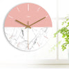 horloge murale scandinave rose